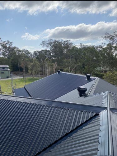 Dark grey Colorbond roof with roof vents