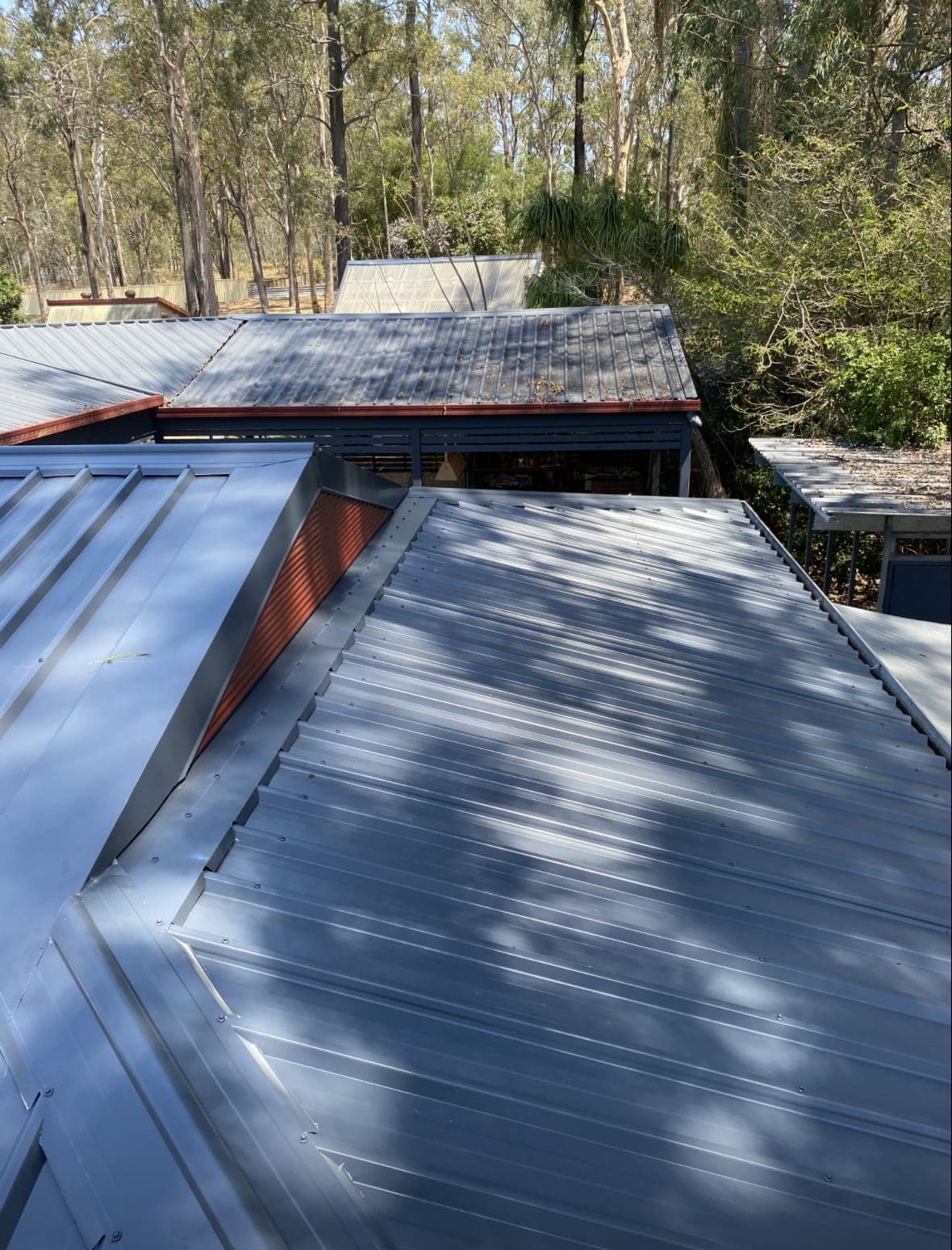 Close view of new light grey Colorbond sheets and flashings